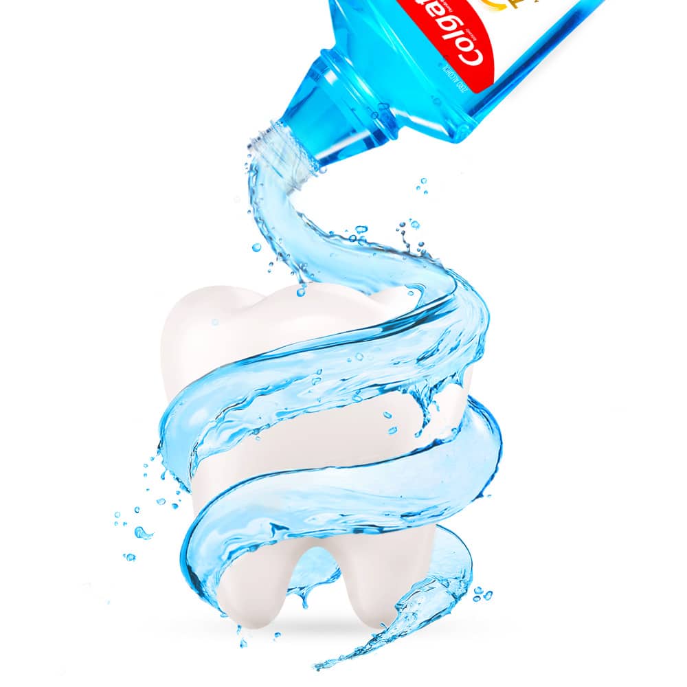Aliran Colgate Total Fresh Mint Mouthwash mengelilingi dan melindungi gigi